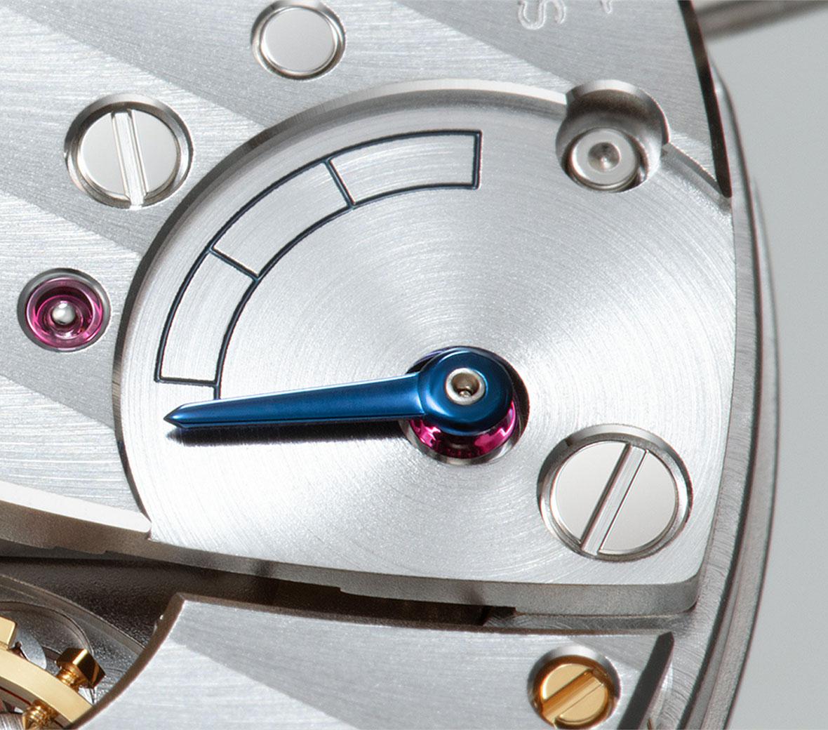 Power Reserve IndicatorThe power reserve indicator hand is placed on a lower layer to reduce the thickness of the movement. As a result, the movement can be placed as close as possible to the back cover.